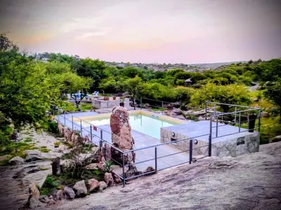 an image of a swimming pool at a house at Kuntur Casas de Campo in Mina Clavero