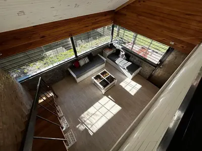an overhead view of a living room in a house at Terra Nostra in Los Reartes