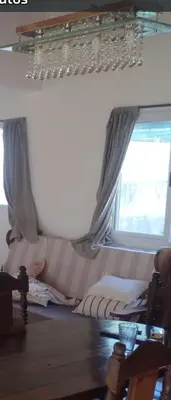 a bed in a room with a window at Adorada in Villa Carlos Paz