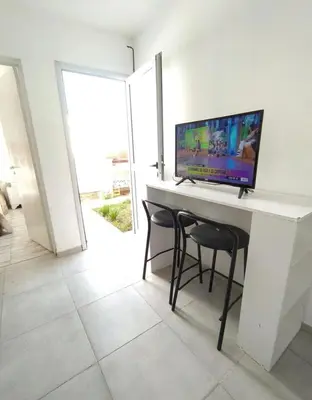 a white desk with a computer on top of it at Rio Segundo Colo 2 in Río Segundo