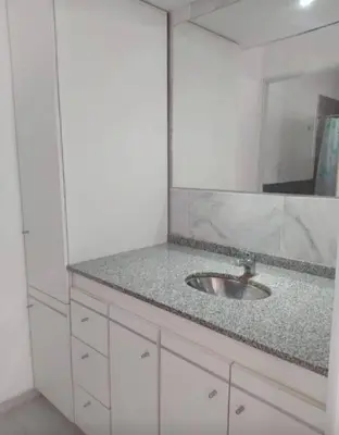 a bathroom with a sink and a mirror at Rio Segundo Colo 2 in Río Segundo
