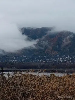 a view of a mountain with clouds and a city at Hermosa Casa para 6 personas en Parque Siquiiman Cordoba in Villa Parque Siquiman