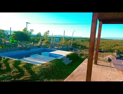 a swimming pool in the middle of a yard at Rincon de Bialet in Bialet Massé