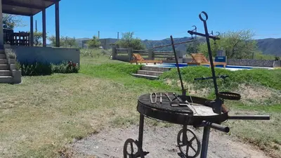 a golf cart with a bunch of clubs on it at Rincon de Bialet in Bialet Massé