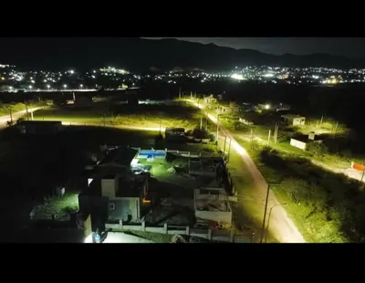 a city lit up at night with street lights at Rincon de Bialet in Bialet Massé