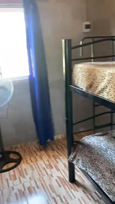 a room with two bunk beds and a window at Dulce Azul in Villa García