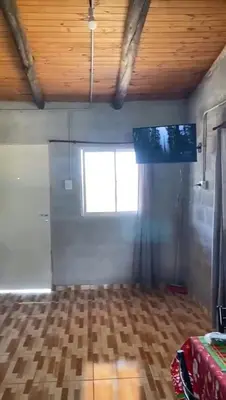 a room with a ceiling with a television in it at Dulce Azul in Villa García