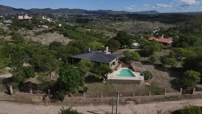 an aerial view of a house with a swimming pool at Casa Villa Carlos paz in Villa Carlos Paz