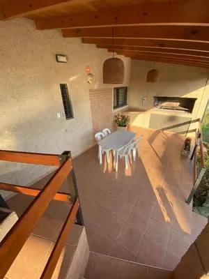 an overhead view of a patio with a table at Casa con vista a las Sierras y pileta privada in San Antonio de Arredondo
