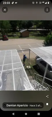 a man riding a skateboard in a parking lot at Cabañas Sprinter in Trapiche