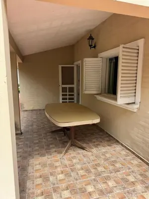 a bench sitting in the corner of a room at Casa 7 Cajones in Trapiche