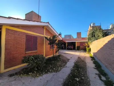 an empty alley in front of a brick building at Sweet Angel in Villa Cura Brochero