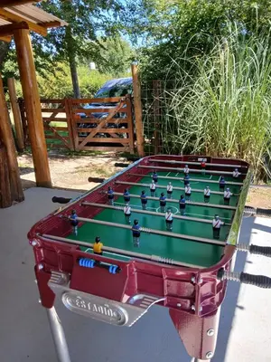 a pool table sitting on top of a table at Cabañas Mairu in Potrero de Garay