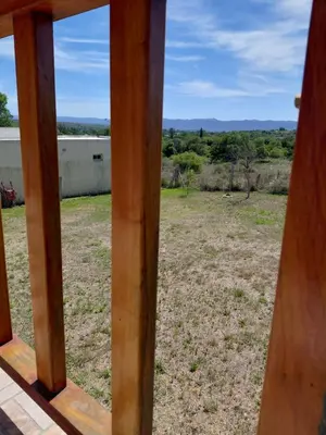 a view of a field from a window of a house at Mi Destino in Tanti Nuevo