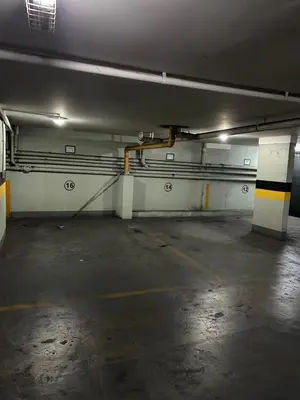 an empty parking garage with a parking lot at Dpto Carlos Paz in Villa Carlos Paz