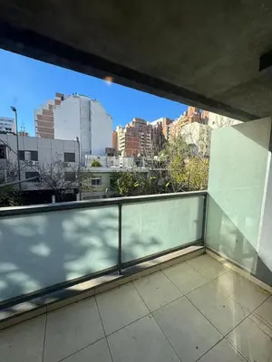 a balcony with a view of a city skyline at El cercano a todo in Cordoba