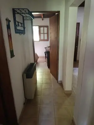 a hallway of a house with a room with a floor at Das Kleine Nest in Villa General Belgrano