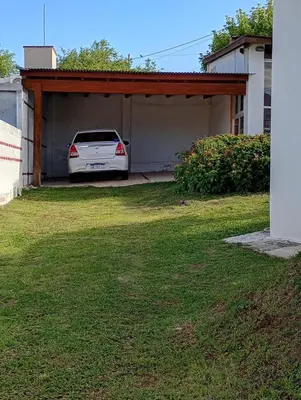 a car is parked in a garage at Casa Serrana Punilla in Santa María
