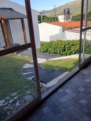 a view from a window of a yard at Casa Serrana Punilla in Santa María