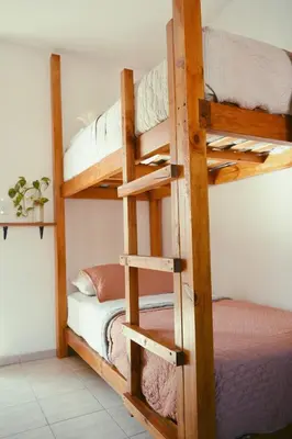a bunk bed room with two bunk beds at Casa Revol céntrica ideal familias-grupos hasta 12 pax in Cordoba