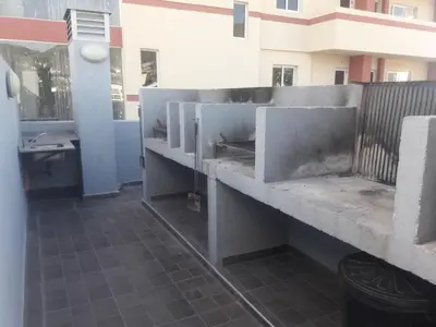 a room with a concrete counter with a sink at Terraza Carlos Paz in Villa Carlos Paz