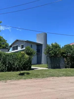 a house on the side of a road at Las Tole - Potrero de Garay in La Estancia