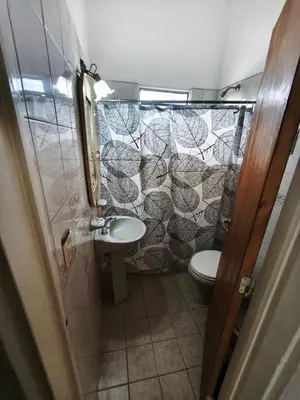 a bathroom with a sink and a toilet at Dpto Villa Carlos Paz max 5 personas in Villa Carlos Paz