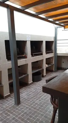 a room with empty shelves on the wall at Sam Mira 1 in Villa Carlos Paz