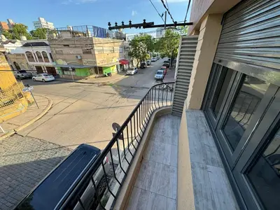 a balcony of a building with a view of a street at Apart's Sobremonte - Deptos Modernos in Rio Cuarto