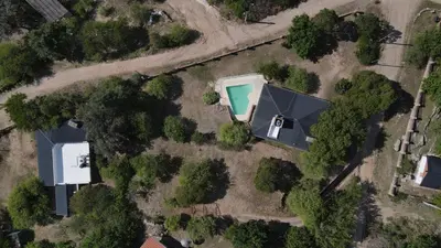 an overhead view of a house with a swimming pool at Casa Villa Carlos Paz in Villa Carlos Paz