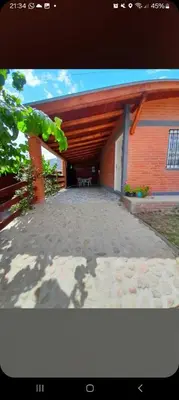 a view of a building with a patio at Cabañas Nuestro Valle Cura Brochero in Villa Cura Brochero