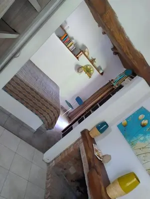an overhead view of a living room with a fireplace at Linaje del Champaqui - San Javier in Villa de Las Rosas