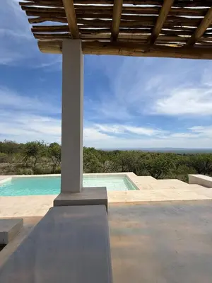 a swimming pool with a view of the ocean at Casa Veta in La Porteña