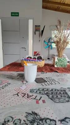 a room with a table with a bowl on it at cabaña el lago in San Ignacio