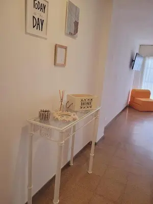 a white table in a room with a box on it at Departamento Patio Olmos in Cordoba