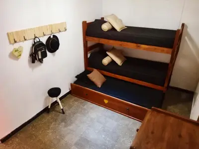 an overhead view of a room with bunk beds at Casa centrica in Villa Carlos Paz