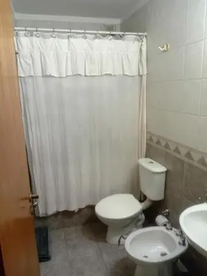 a bathroom with a toilet and a sink at Nueva Córdoba primer piso Externo in Cordoba