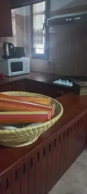 a wooden counter with a table with towels on it at Departamento con inmejorable ubicacion en Villa Carlos Paz in Villa Carlos Paz