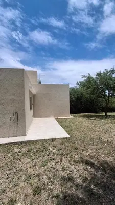 a building with graffiti on the side of it at Hermosa Casa Moderna en el Mirador del Lago in Bialet Massé