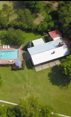 an overhead view of a white building with a pool at Rocco Housse in Los Hornillos