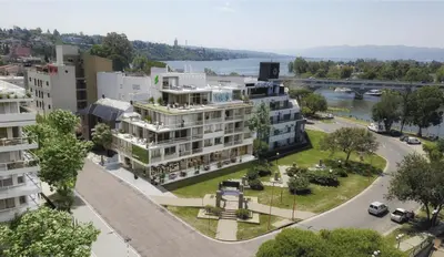 an aerial view of a city with a river and buildings at ALOJATE PREMIUM VILLA CARL0S PAZ - STEFANO 1 dor in Villa Carlos Paz