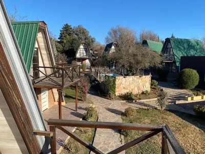 a view from the balcony of a house at Complejo alpinas del valle in Santa Rosa de Calamuchita