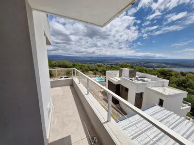 a view from the balcony of a house at DEPTO con piscina Climatizada para 6 in Malagueño