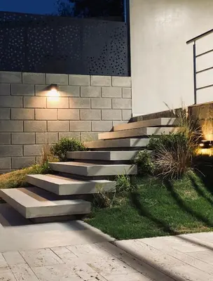 a set of concrete stairs in front of a building at Casa lujosa en Tanti in Tanti