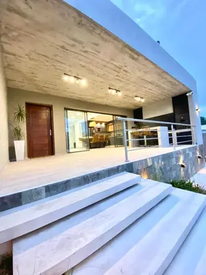 an image of a house with stairs in front of it at Casa lujosa en Tanti in Tanti