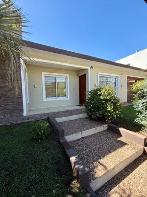 a house with stairs in front of it at Casa Impecable, Piscina, Cochera, a 100 m del Lago, Familias in Villa Carlos Paz