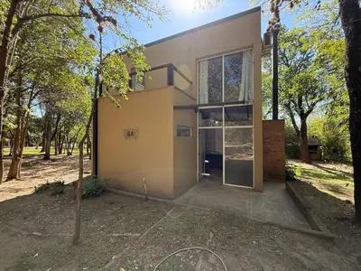 a house in the middle of a forest at Gea in Las Chacras (La Paz)