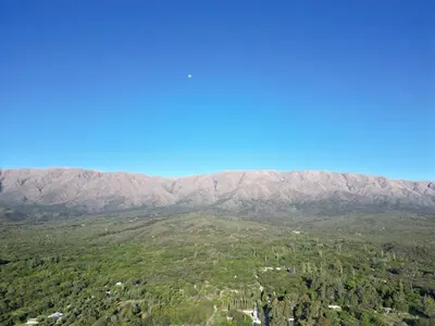 an aerial view of a valley with mountains in the background at Gea in Las Chacras (La Paz)