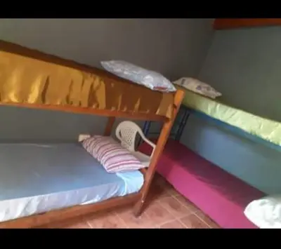 a bunk bed with two bunk beds in a room at casa en bialet masse in San Roque
