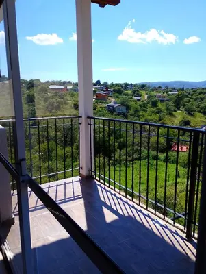 a view from the balcony of a house at Wualküre, acogedora cabaña en Villa General Belgrano in Villa General Belgrano
